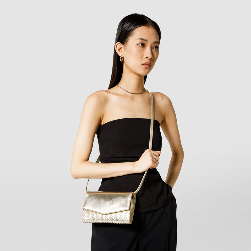 Clutch with shoulder strap in mosaico - light gold