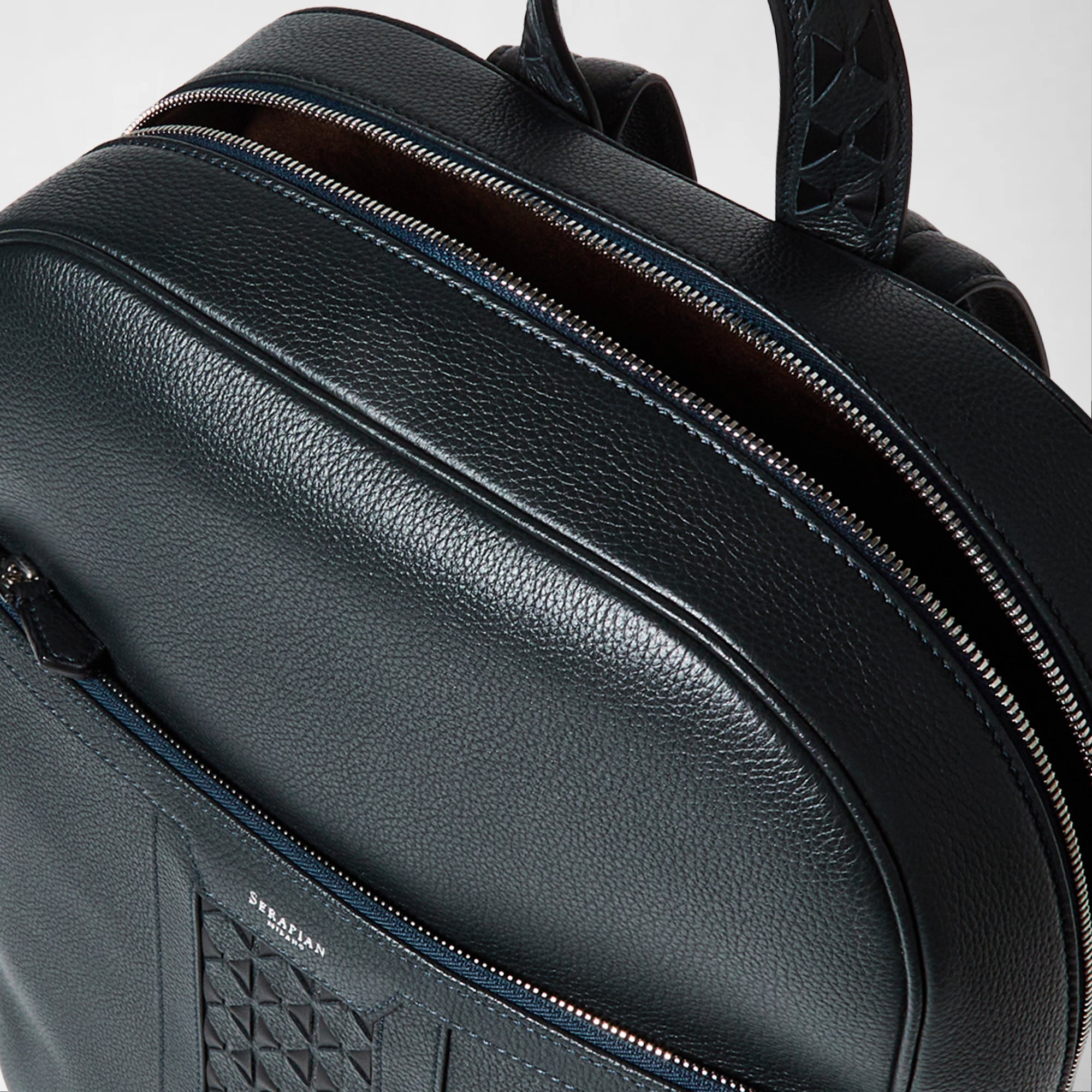 Designer leather and Mosaico backpack navy blue