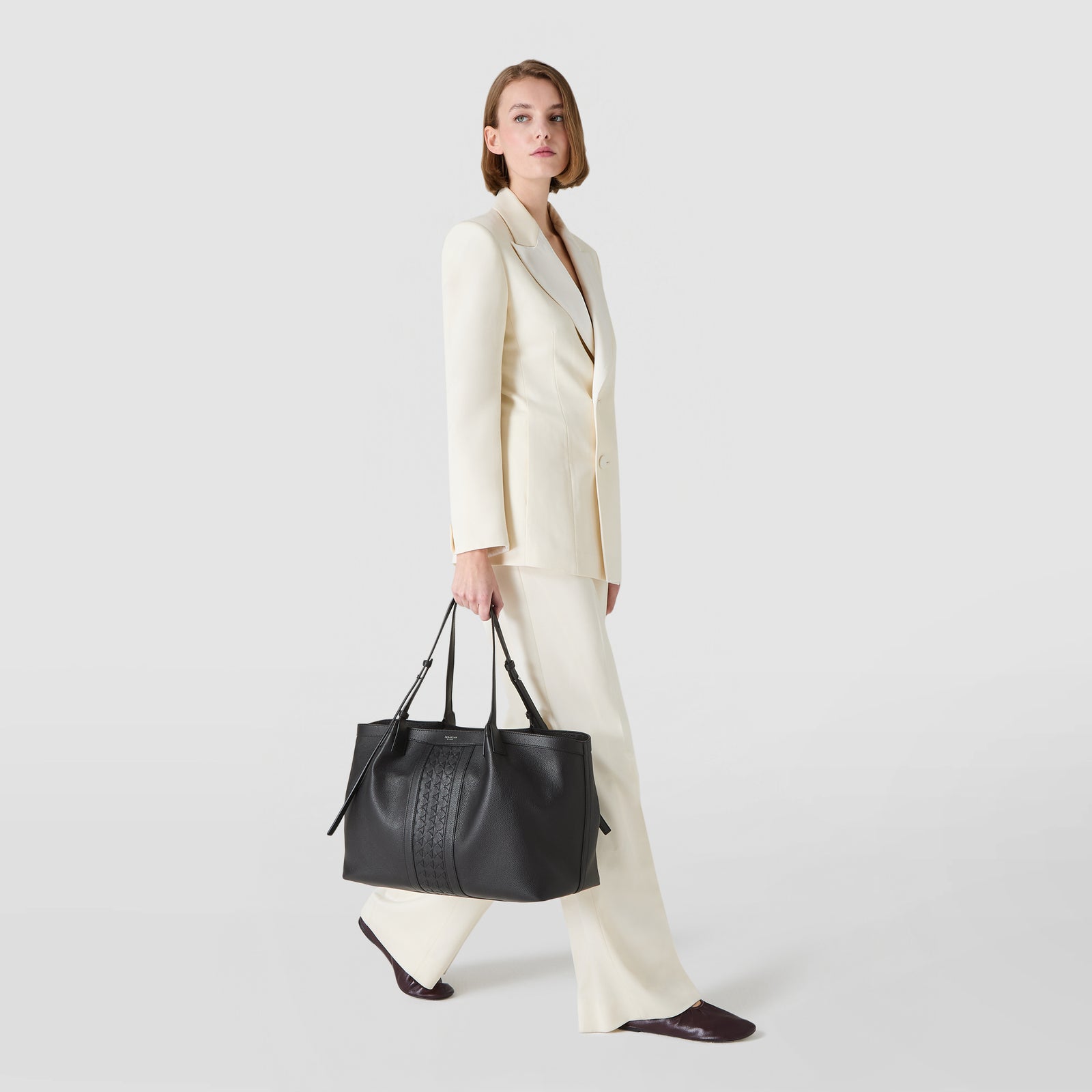 Designer black leather and Mosaico tote bag