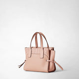 Front view: SMALL MARO BAG IN CACHEMIRE LEATHER AND MOSAICO presented on a white background; antique-rose mosaico insert, two carrying handles and side leather knots. Visible lettering: 'SERAPIAN'.