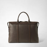 Front view: SOFT BRIEFCASE IN CACHEMIRE LEATHER AND MOSAICO is shown against a light background; the espresso-colored leather bag features two handles, a zipper, and decorative Mosaico strips.