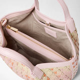 Detail view – MINI SECRET BAG IN MOSAICO MESTIERI D'ARTE: opened interior view with a central zip compartment, soft light-beige lining and pastel-pink braided exterior pattern. Visible lettering: SERAPIAN MADE IN ITALY