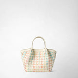 Front view: MINI SECRET BAG IN MOSAICO MESTIERI D'ARTE shows a small handcrafted bag with cream-colored handles and a pastel-colored geometric mosaic pattern, on a plain white background.
