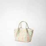 MINI SECRET BAG IN MOSAICO MESTIERI D'ARTE presents a cream-colored, hand-braided net with pastel Bokashi triangles and two handles; front view; embossed 'SERAPIAN' lettering visible.
