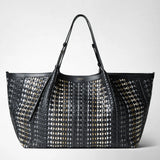 Frontal view: MAXI SECRET TOTE BAG IN MOSAICO MESTIERI D'ARTE features a large, structured tote with a black and metallic geometric mosaic pattern, adjustable handles, and visible 'SERAPIAN' branding.