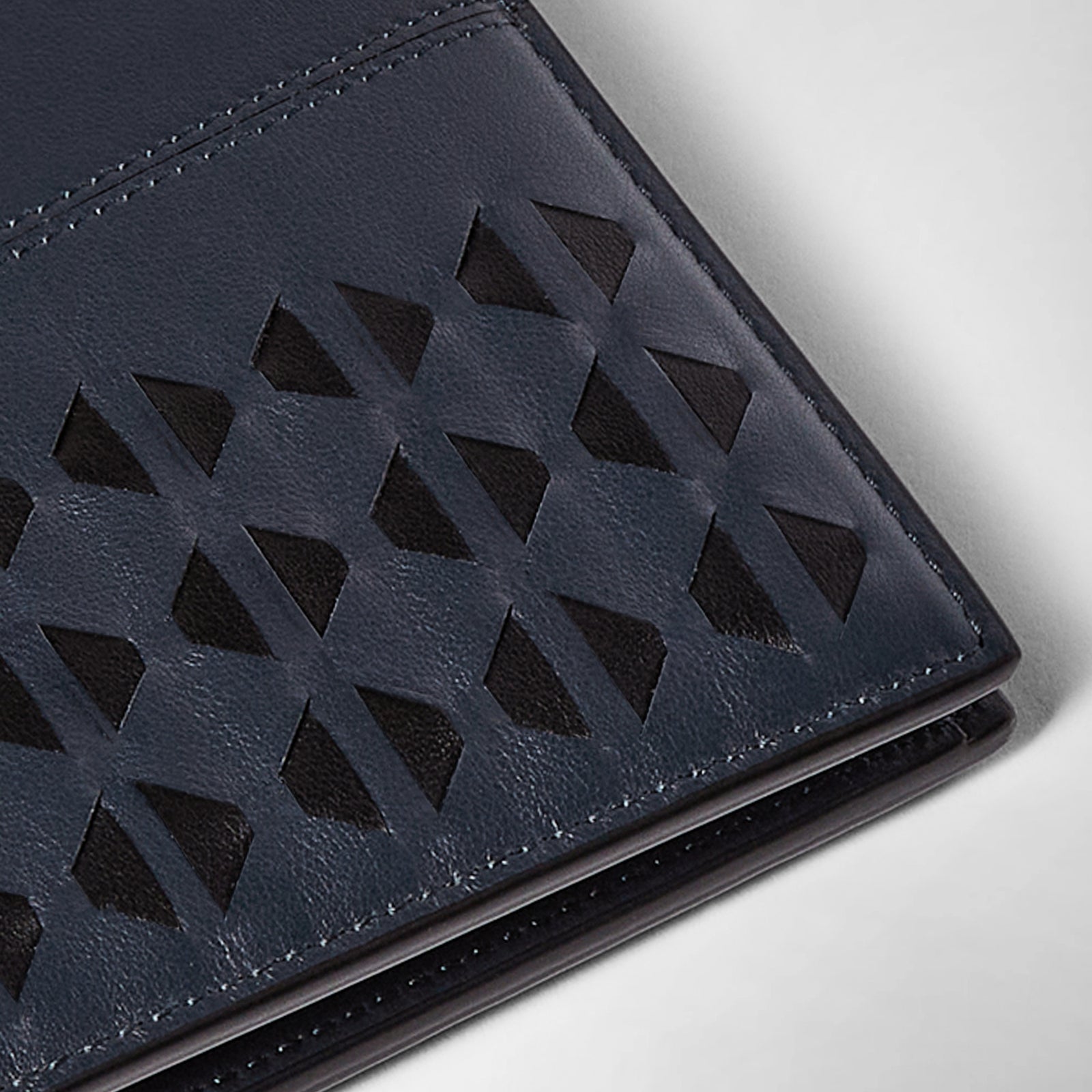 Mens bifold leather wallet in Mosaico navy blue