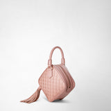 Side view: PETRA HANDBAG IN MOSAICO shows a blush pink, diamond-shaped handbag in nappa leather with a top handle, geometric pattern, zipper closure, and a large leather tassel.
