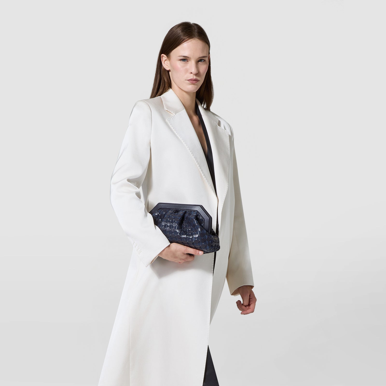Blue Secret clutch bag​ in leather and Mosaico