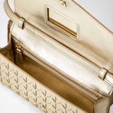 Clutch with shoulder strap in mosaico - light gold