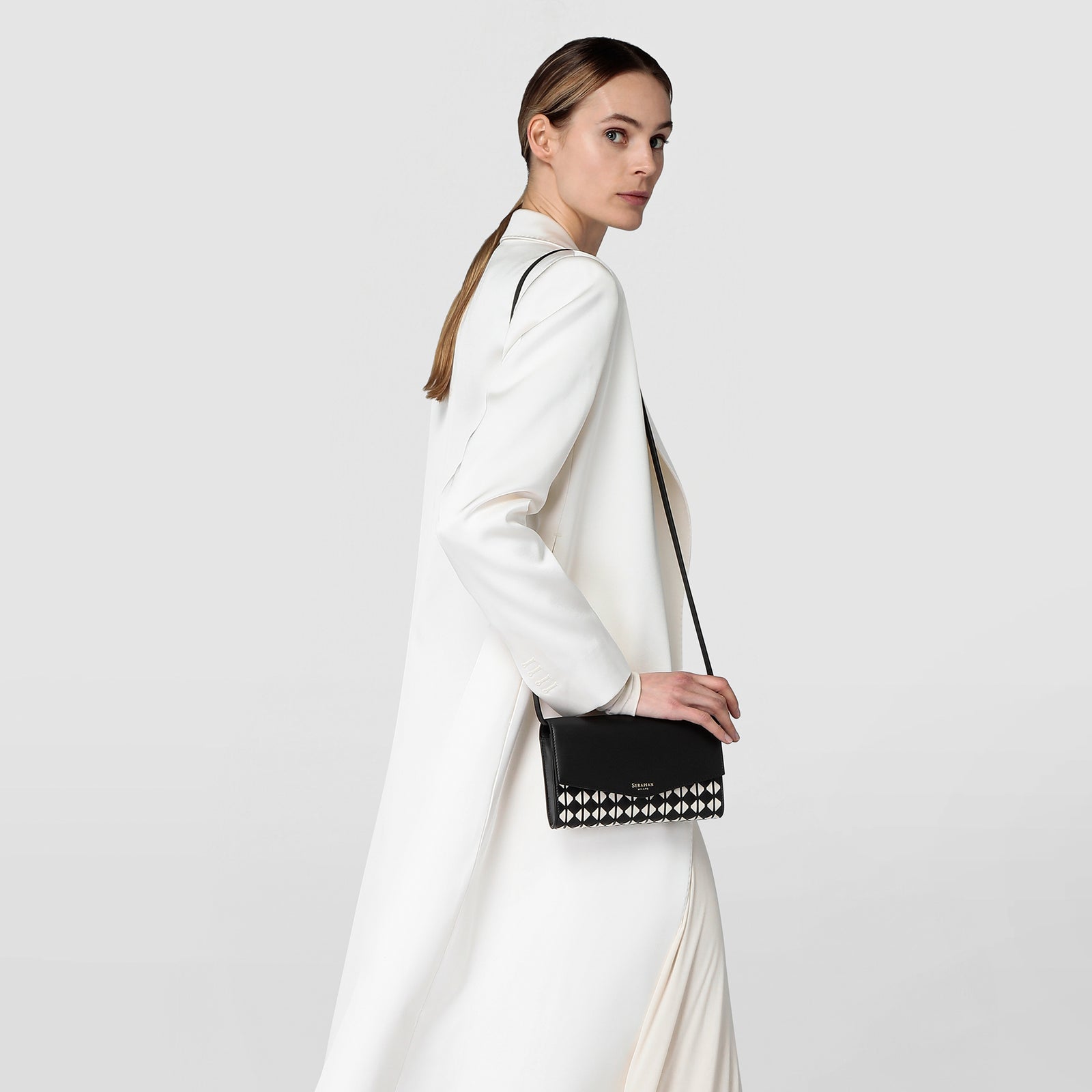 Clutch with shoulder strap mosaico black off-white