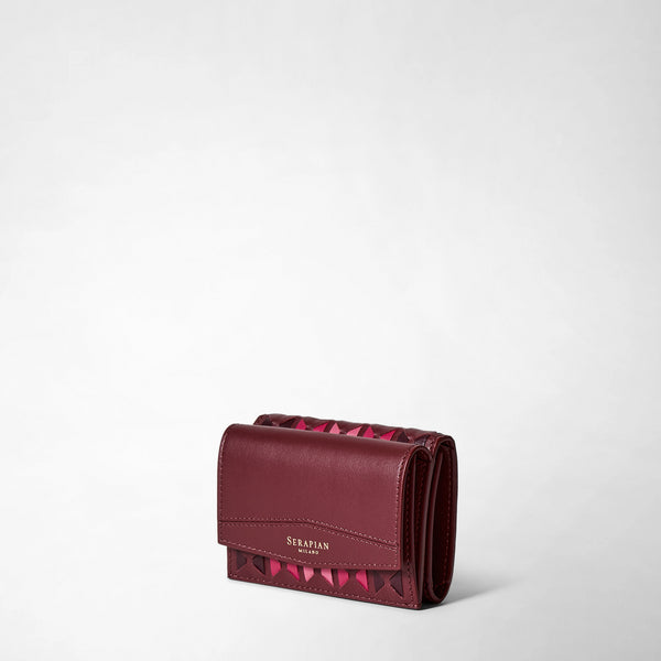 Three-quarter frontal view: MINI TRI-FOLD WALLET IN MOSAICO features a compact rosewood nappa leather wallet with handwoven mosaic pattern and gold lettering &#39;SERAPIAN MILANO&#39; on the flap.