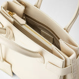 Borsa a mano meliné in pelle seta - cream