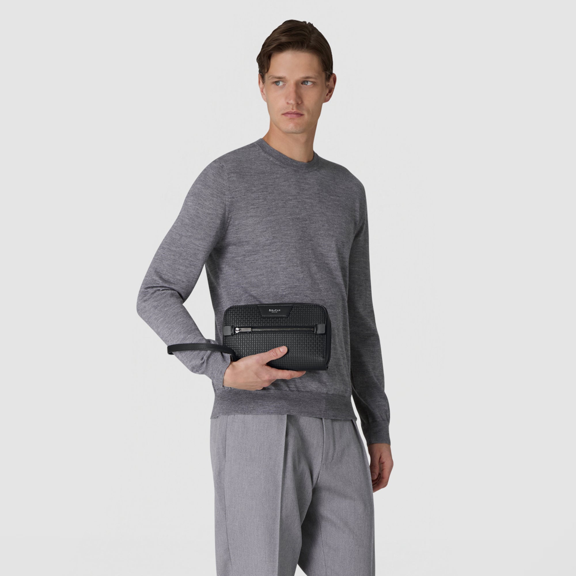 Black designer clutch bag in Stepan