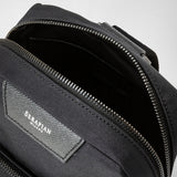 Sling bag in recycled twill and evoluzione leather - eclipse black