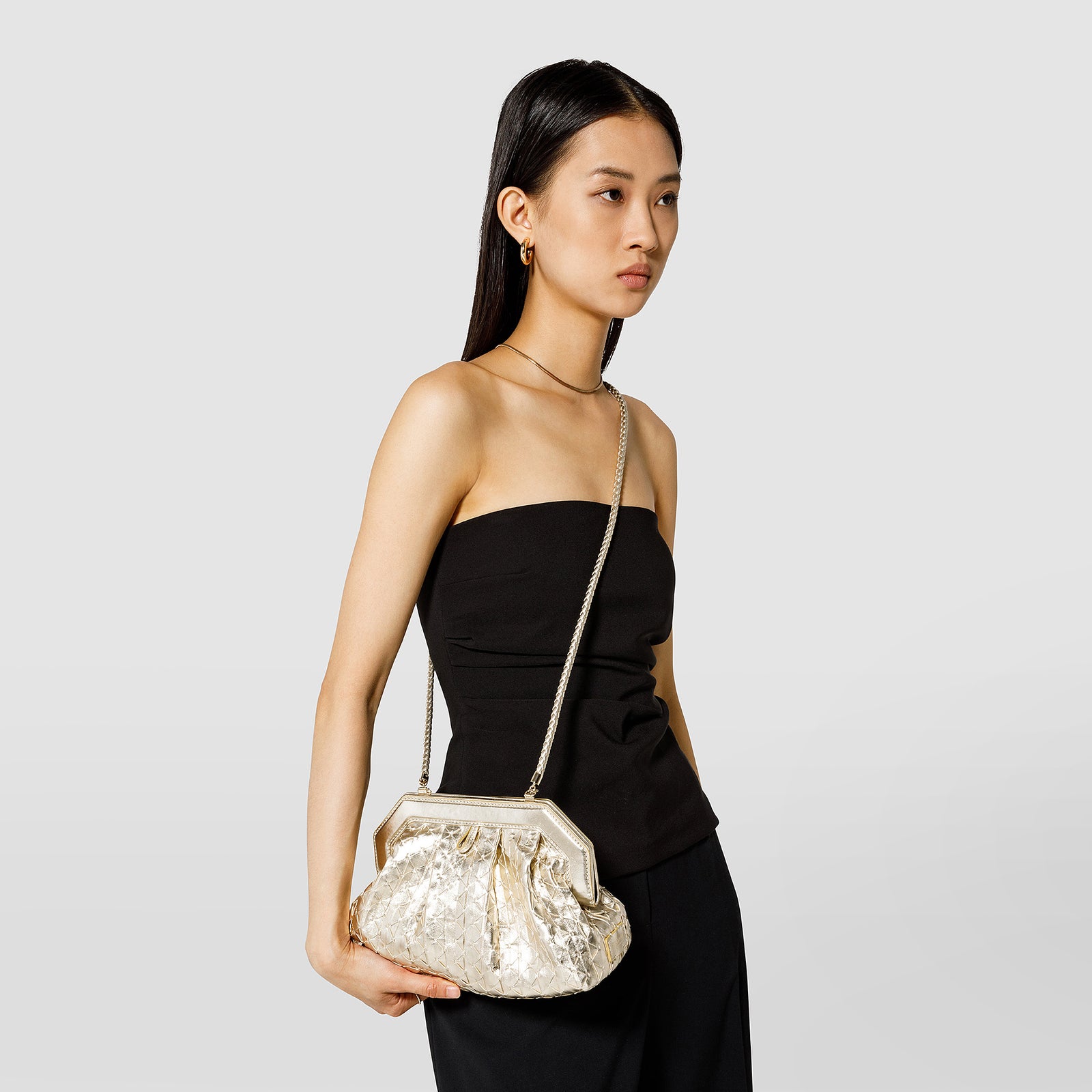 Designer leather clutch bag in Mosaico light gold Designer leather clutch bag in Mosaico light gold