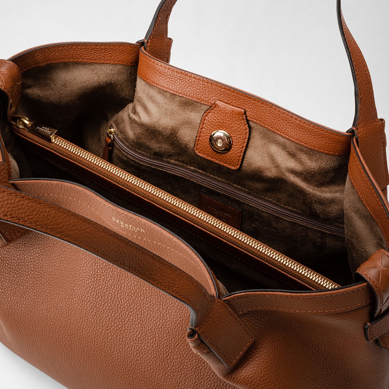 Small secret tote bag in rugiada leather cuoio – Serapian