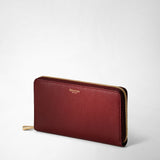 Zip-around wallet in rugiada leather - burgundy