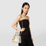 Mini sac meliné en cuir seta - light gold