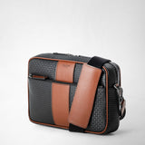 Sling backpack in evoluzione leather - black/cuoio